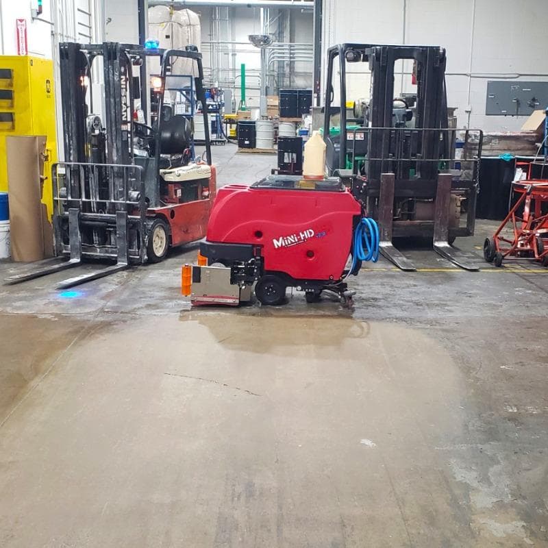 FactoryCat Walk Behind Floor Scrubbers Mini-HD warehouse concrete - https://assets.factorycat.com/demoImages/2025/april/Mini-HD-Walk Behind Floor Scrubbers-warehouse-concrete-Richmond-USA-650.jpg - 800 - 800 - 650 A FactoryCat Mini-HD Walk Behind Floor Scrubber after cleaning concrete in w a warehouse in Richmond, Virginia